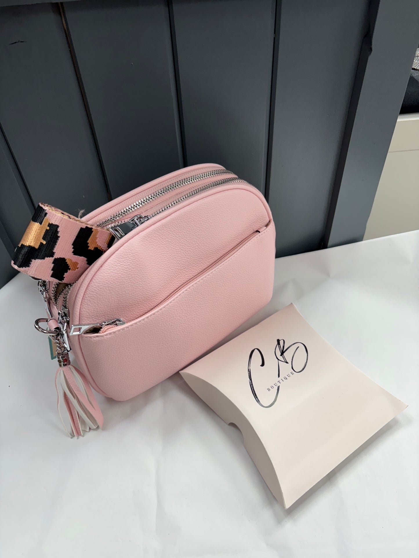 Pink curved hand Bag with tassle