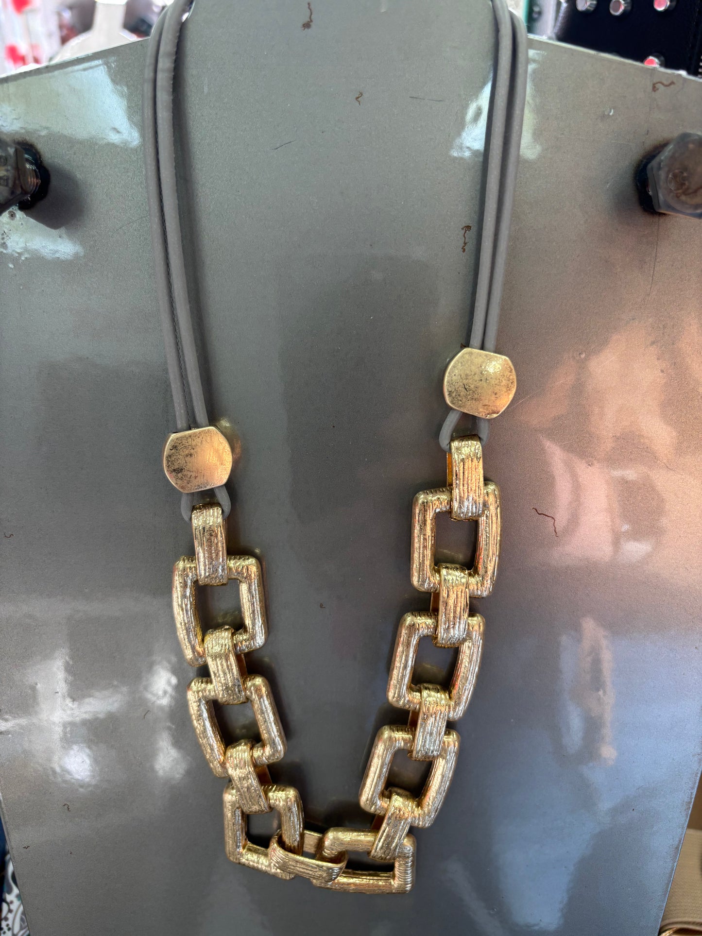 Gold Short chain link necklace on leather