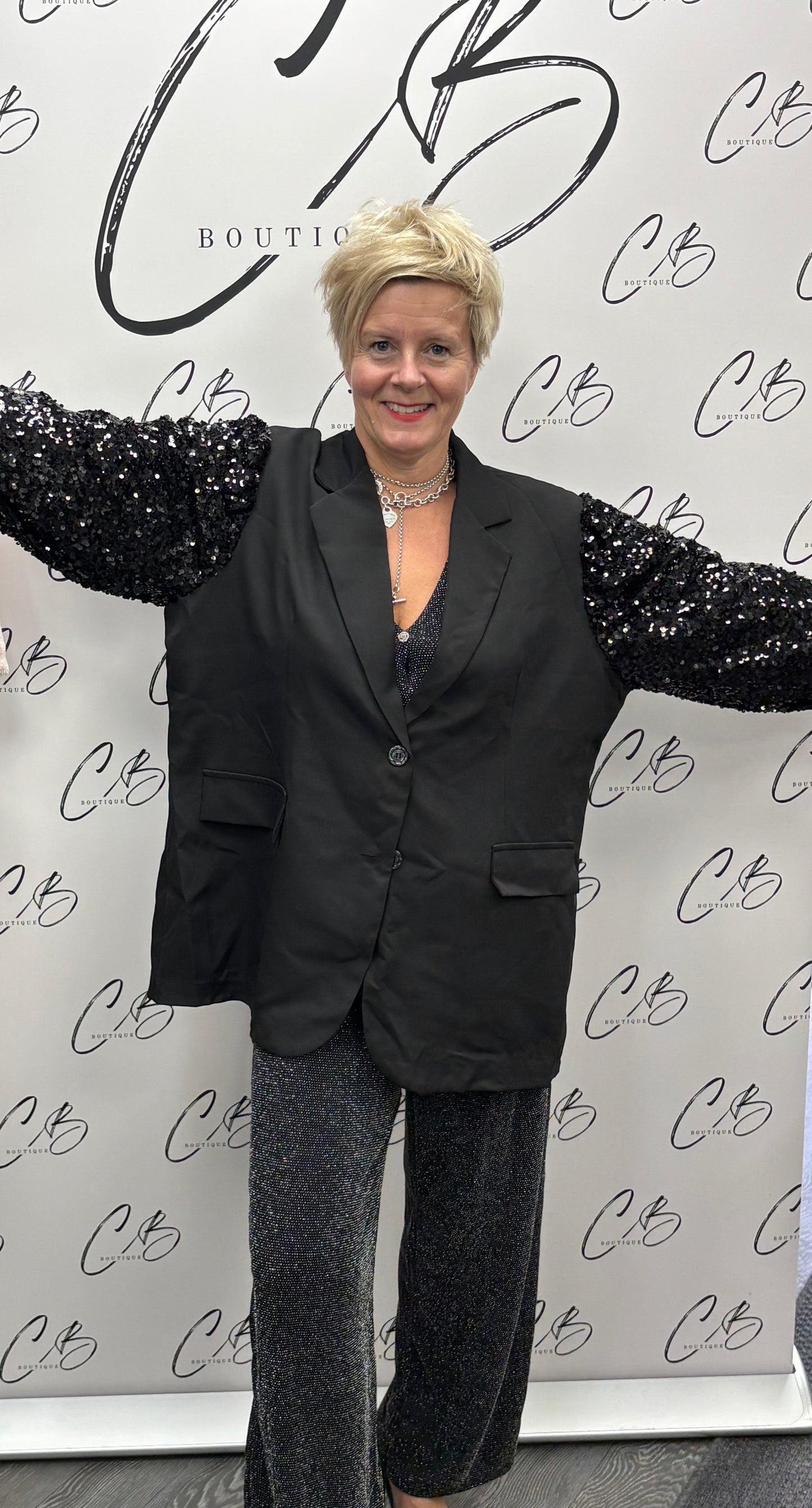 Black sequin sleeved blazer