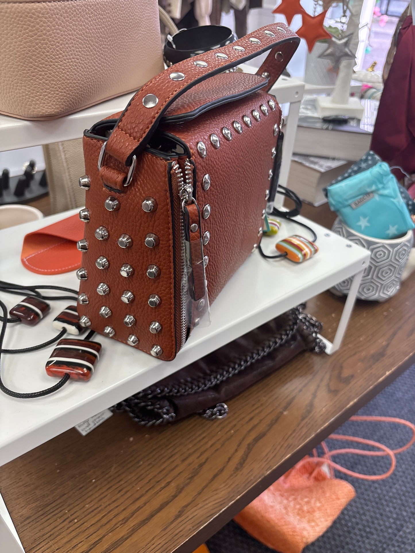 Tan studded hand bag
