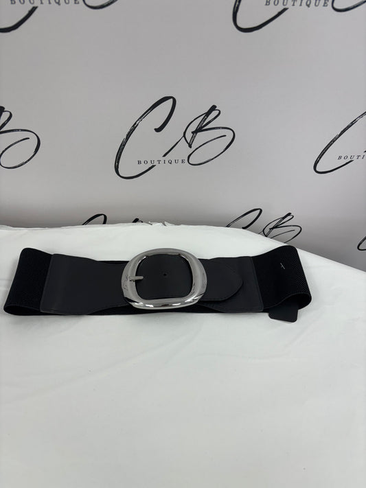 Black belt with large silver buckle