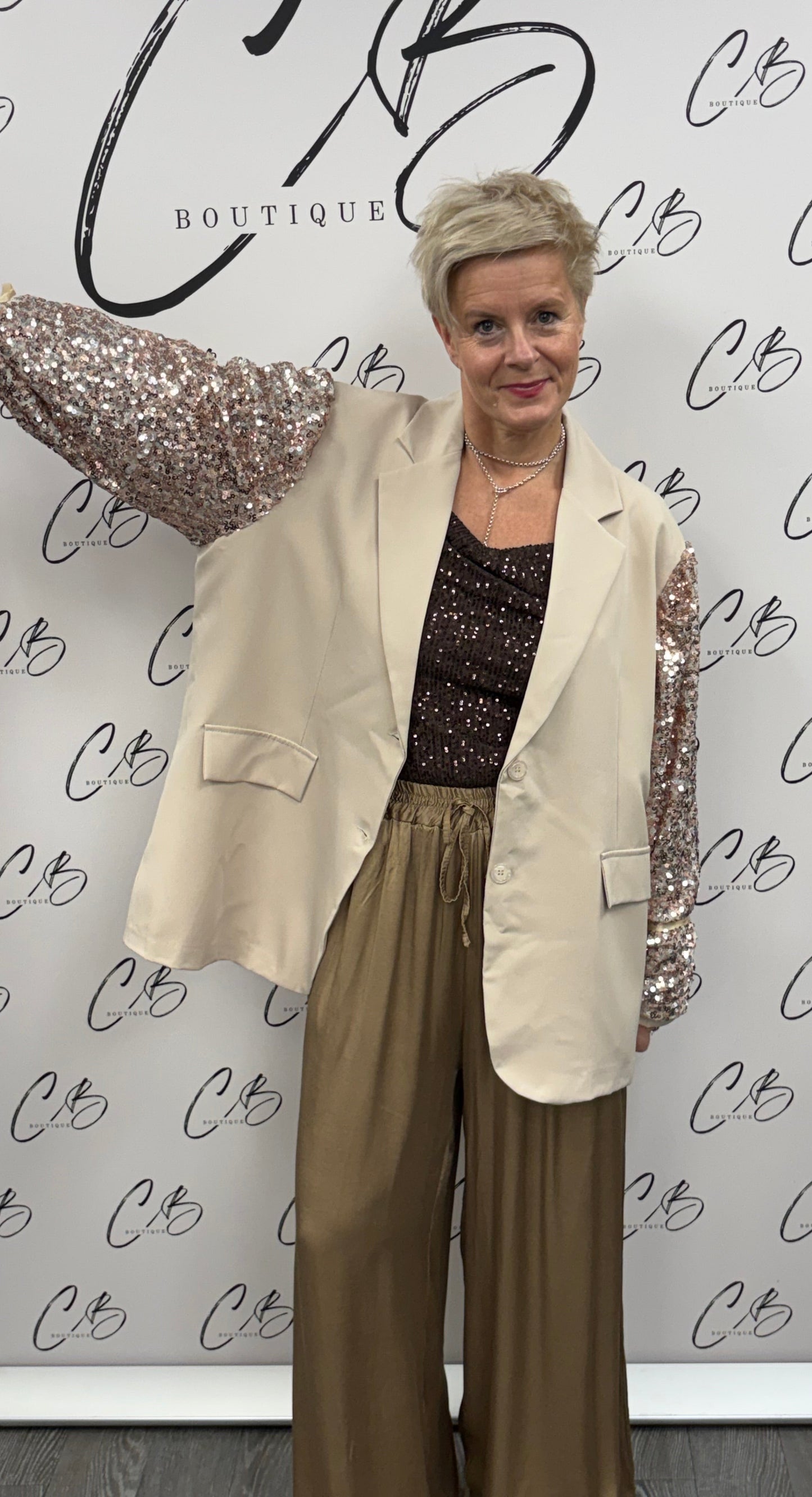 Champagne sequin sleeved blazer