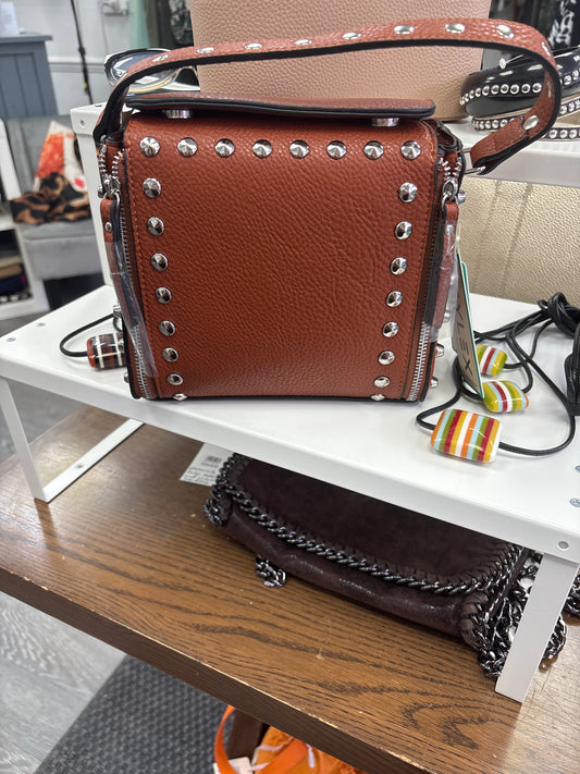 Tan studded hand bag