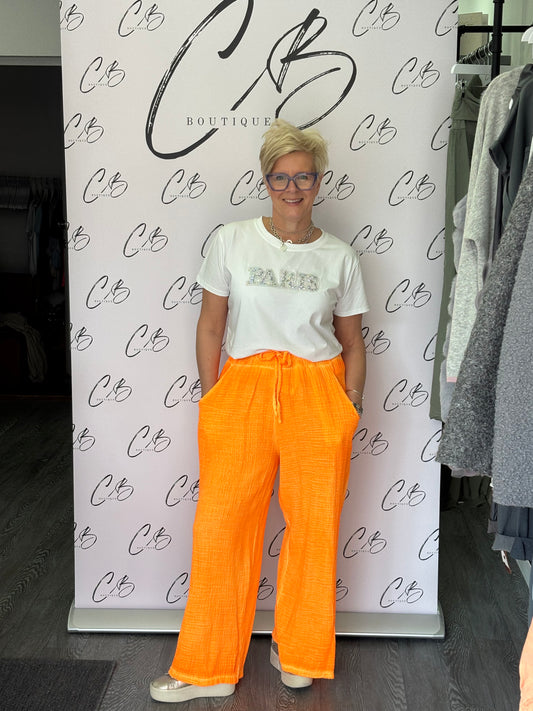 Neon orange wide leg trousers