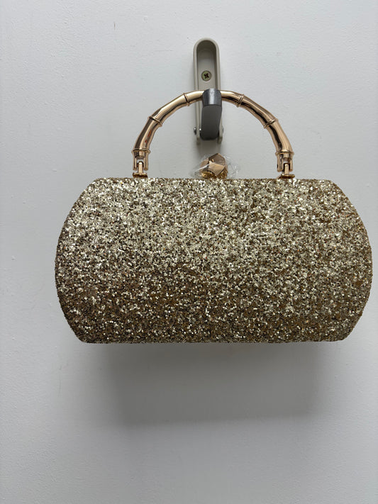 Gold glitter hand bag with gold handle