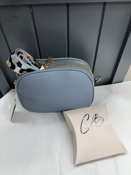 Pale blue curved hand Bag